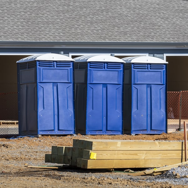 what is the cost difference between standard and deluxe portable restroom rentals in Goshen